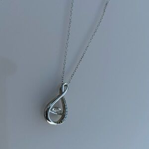 Sterling Silver dancing twist pendant